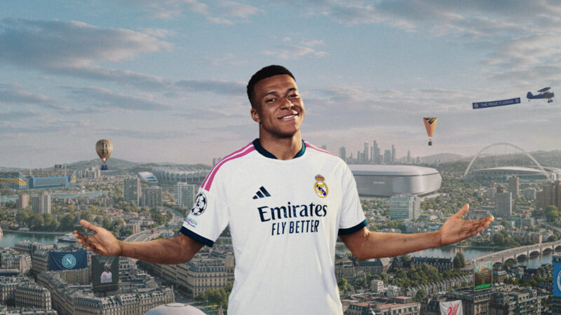 EA Sports FC 27 key art showing star players in dynamic action pose against a stadium backdrop