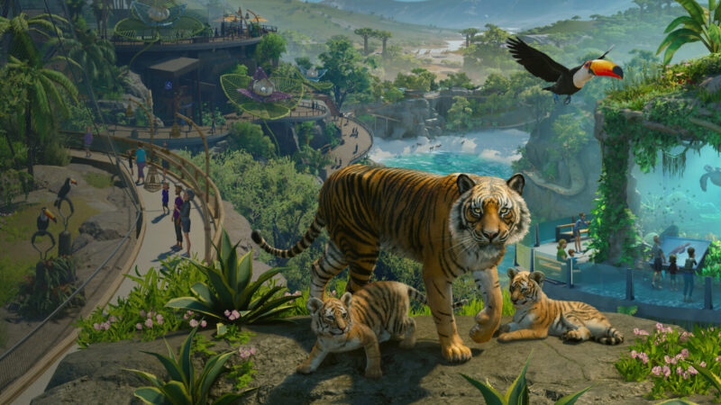 Planet Zoo 2 key art showing zoo habitats with a variety of animals